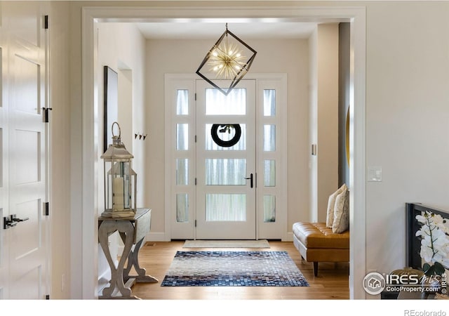 4198 Prestwich Ct, Timnath, CO 80547 - foyer entrance featuring light wood-style flooring