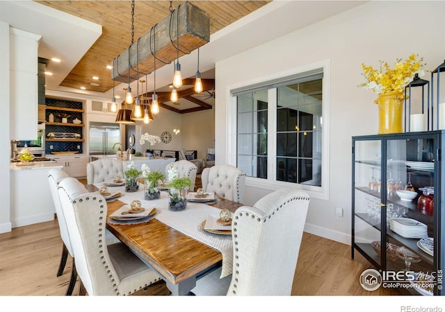 4198 Prestwich Ct, Timnath, CO 80547 - dining space featuring wooden ceiling, light wood finished floors, recessed lighting, and a chandelier