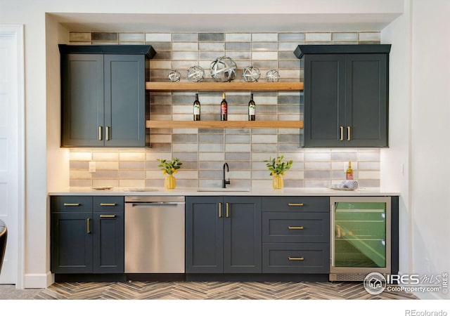 4198 Prestwich Ct, Timnath, CO 80547 - indoor wet bar with beverage cooler, dishwasher, and decorative backsplash