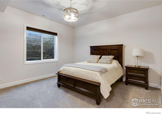 4198 Prestwich Ct, Timnath, CO 80547 - bedroom featuring light colored carpet and a chandelier