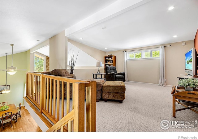 1470 71st Ave, Greeley, CO 80634 - carpeted living room with healthy amount of natural light, recessed lighting, and vaulted ceiling