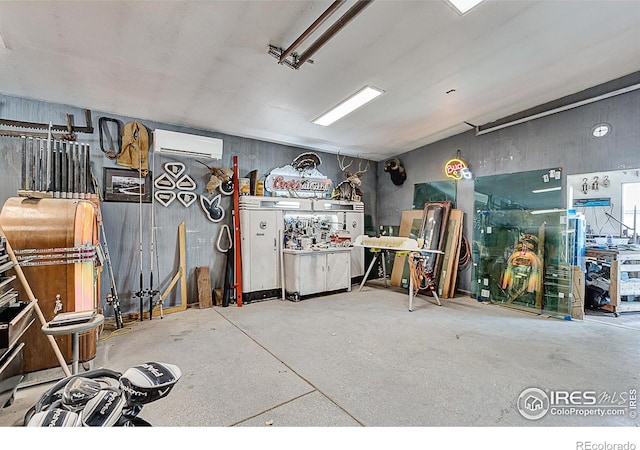 1470 71st Ave, Greeley, CO 80634 - garage with a wall mounted air conditioner and a workshop area