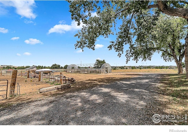 1470 71st Ave, Greeley, CO 80634 - view of yard with an outbuilding and a view of rural / pastoral area