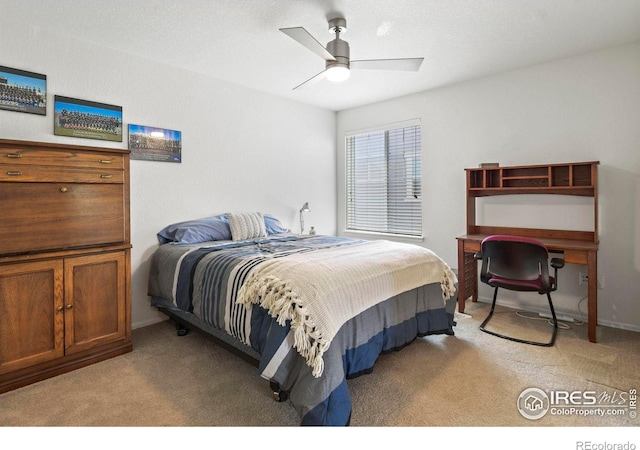 833 Carbonate Ln, Erie, CO 80516 - bedroom with light colored carpet and a ceiling fan