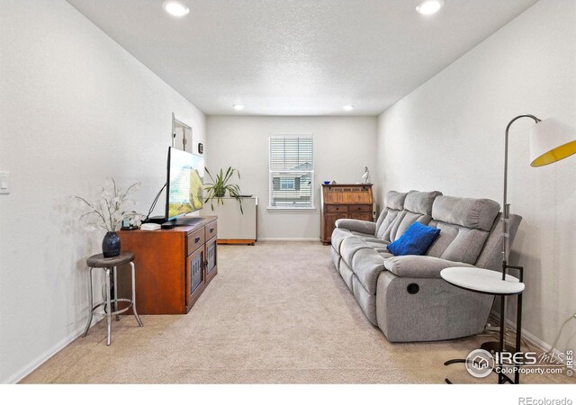 833 Carbonate Ln, Erie, CO 80516 - living room with light colored carpet and recessed lighting