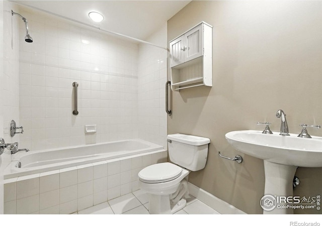 1631 N Emerson St Unit 207, Denver, CO 80218 - bathroom with tiled shower / bath and tile patterned flooring