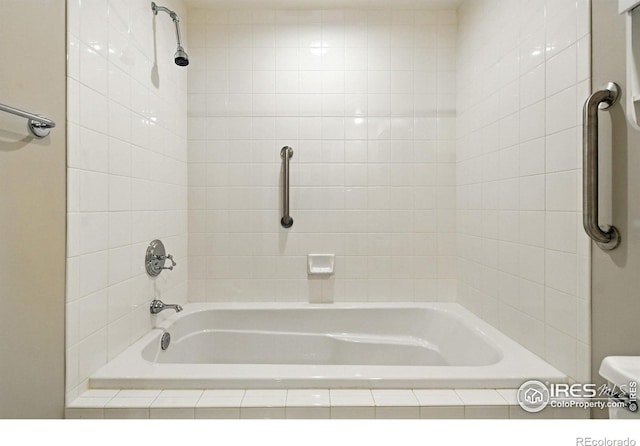 1631 N Emerson St Unit 207, Denver, CO 80218 - full bath featuring toilet and tiled shower / bath