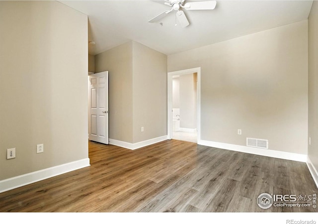 1631 N Emerson St Unit 207, Denver, CO 80218 - spare room featuring ceiling fan and wood finished floors