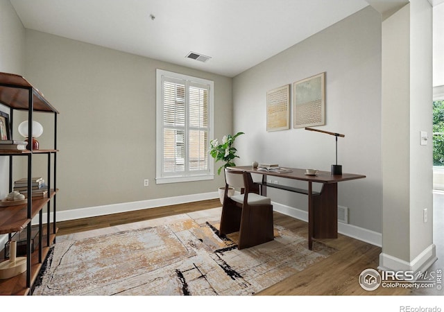 1631 N Emerson St Unit 207, Denver, CO 80218 - home office with wood finished floors