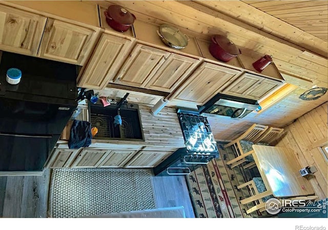 2780 Camel Rock Rd, Red Feather Lakes, CO 80545 - kitchen with wood finished floors and wood ceiling