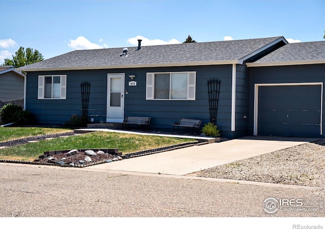 4616 Homestead Ct, Greeley, CO 80634 - ranch-style house featuring an attached garage, roof with shingles, concrete driveway, and a front lawn