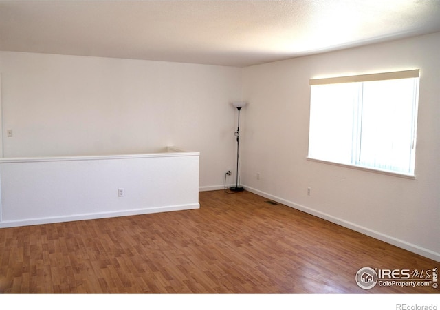 4616 Homestead Ct, Greeley, CO 80634 - unfurnished room with wood finished floors