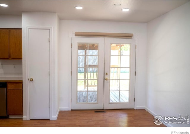 4616 Homestead Ct, Greeley, CO 80634 - doorway featuring french doors, light wood-style floors, and recessed lighting