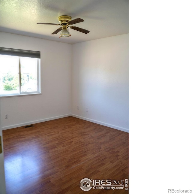 4616 Homestead Ct, Greeley, CO 80634 - empty room with wood finished floors and ceiling fan