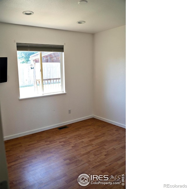 4616 Homestead Ct, Greeley, CO 80634 - unfurnished room featuring wood finished floors and baseboards