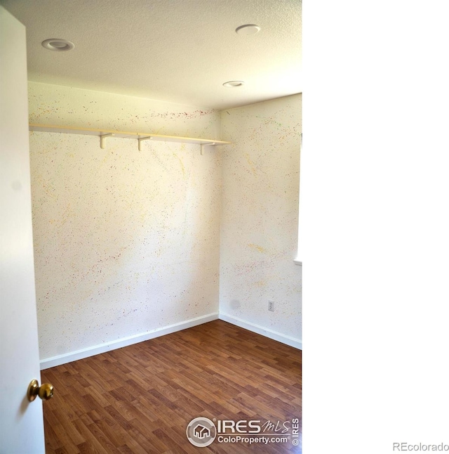 4616 Homestead Ct, Greeley, CO 80634 - unfurnished room featuring wood finished floors and baseboards