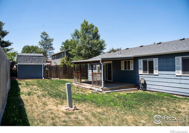 4616 Homestead Ct, Greeley, CO 80634 - fenced backyard with a storage unit and a deck