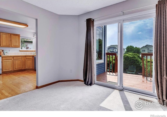 147 Keystone Trl, Broomfield, CO 80020 - empty room featuring light colored carpet and baseboards
