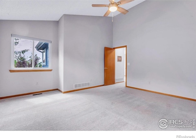 147 Keystone Trl, Broomfield, CO 80020 - empty room with carpet floors, ceiling fan, and high vaulted ceiling