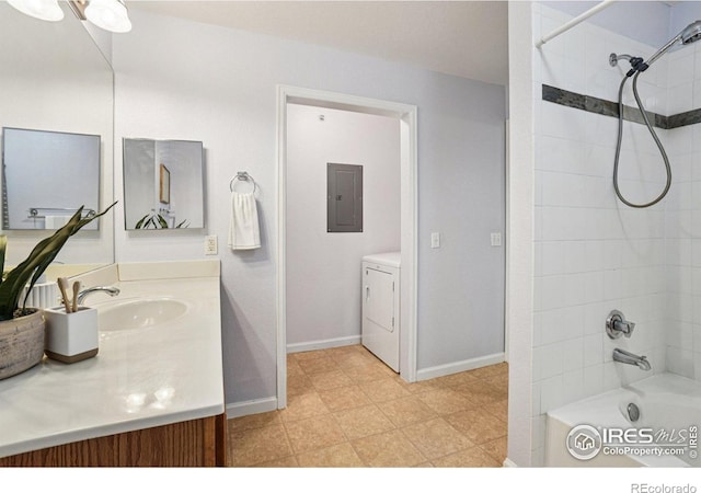 5620 Fossil Creek Pkwy Unit 6303, Fort Collins, CO 80525 - full bath featuring electric panel, washer / clothes dryer, vanity, and washtub / shower combination