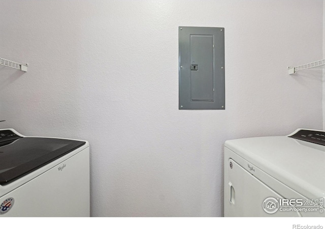 5620 Fossil Creek Pkwy Unit 6303, Fort Collins, CO 80525 - laundry room featuring electric panel and washer and dryer