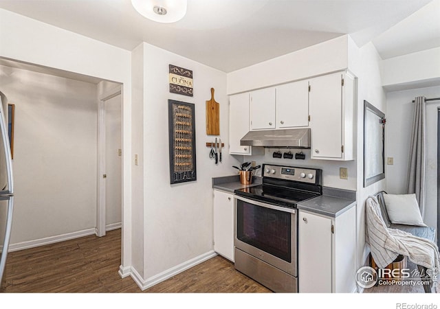 7250 Eastmoor Dr, Denver, CO 80237 - kitchen with stainless steel electric stove, under cabinet range hood, dark wood-type flooring, and white cabinets