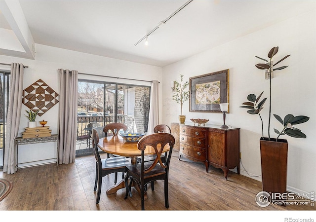 7250 Eastmoor Dr, Denver, CO 80237 - dining room with wood finished floors and rail lighting