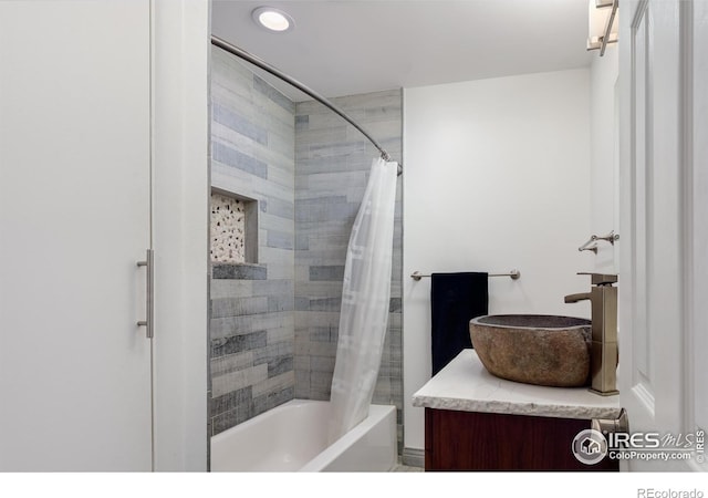 7850 Raleigh Pl, Westminster, CO 80030 - bathroom with shower / tub combo with curtain and vanity