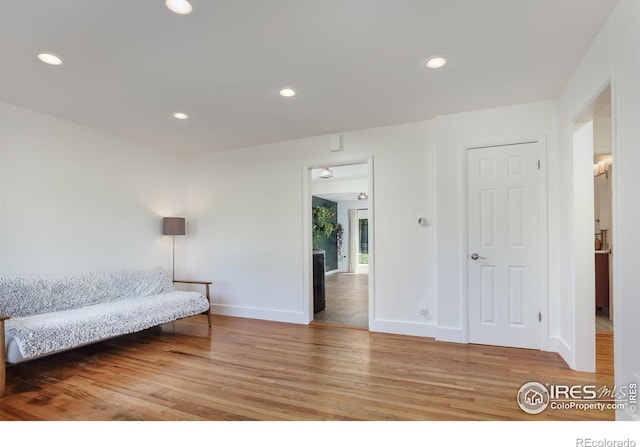 7850 Raleigh Pl, Westminster, CO 80030 - living area with wood finished floors and recessed lighting