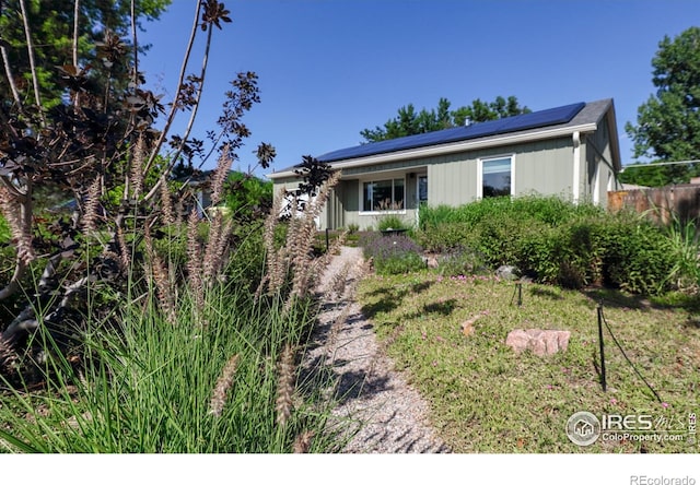 7850 Raleigh Pl, Westminster, CO 80030 - view of front of property with roof mounted solar panels