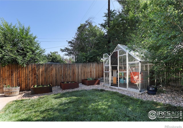 7850 Raleigh Pl, Westminster, CO 80030 - fenced backyard featuring an exterior structure and an outbuilding