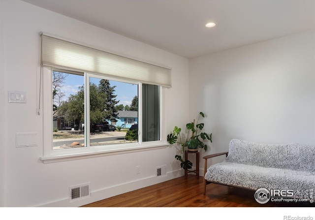 7850 Raleigh Pl, Westminster, CO 80030 - sitting room featuring wood finished floors and recessed lighting