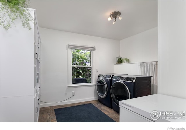 7850 Raleigh Pl, Westminster, CO 80030 - laundry room featuring separate washer and dryer and baseboards