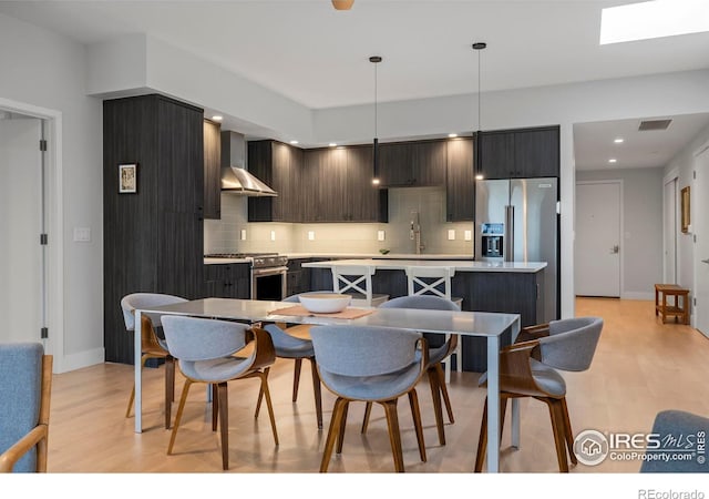 2718 Pine St Unit 301, Boulder, CO 80302 - dining space with light wood-style floors and recessed lighting