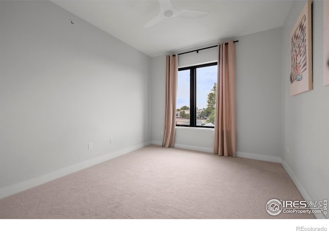 2718 Pine St Unit 301, Boulder, CO 80302 - carpeted spare room with a ceiling fan and baseboards