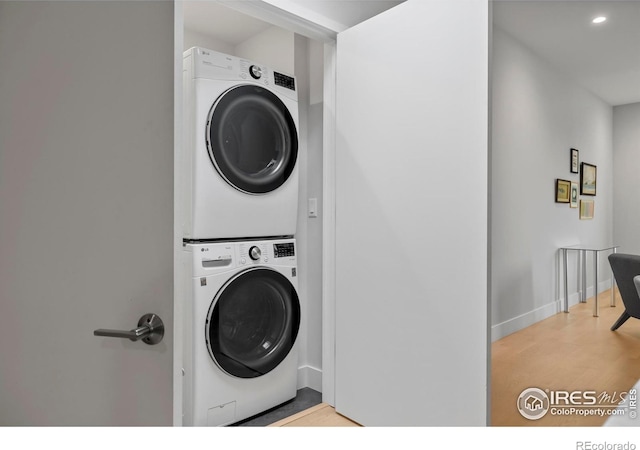 2718 Pine St Unit 301, Boulder, CO 80302 - laundry room featuring stacked washer and clothes dryer and recessed lighting