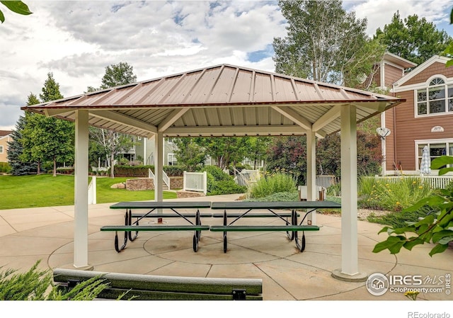 2131 Grays Peak Dr Unit 102, Loveland, CO 80538 - view of community featuring a gazebo, a lawn, and a patio area