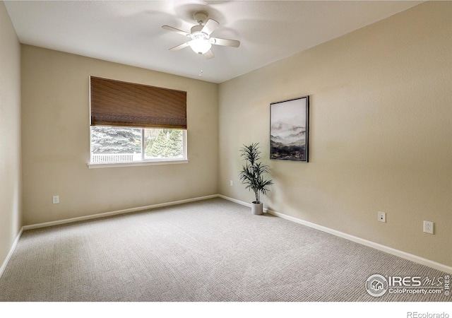 2131 Grays Peak Dr Unit 102, Loveland, CO 80538 - carpeted spare room with ceiling fan and baseboards