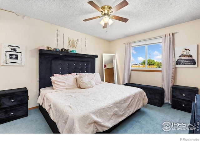 1200-1202 Parker Dr, Longmont, CO 80501 - bedroom featuring carpet, a textured ceiling, and a ceiling fan