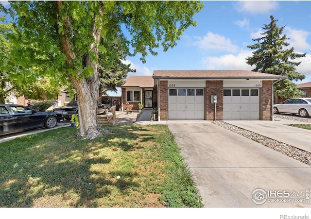1200-1202 Parker Dr, Longmont, CO 80501 - ranch-style home featuring brick siding, driveway, a front lawn, and an attached garage