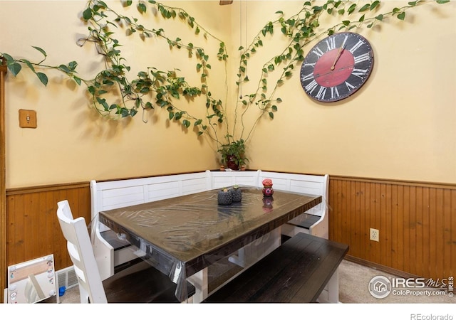 1200-1202 Parker Dr, Longmont, CO 80501 - dining room with wainscoting and wooden walls