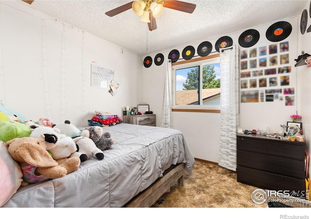 1200-1202 Parker Dr, Longmont, CO 80501 - bedroom featuring a textured ceiling, carpet flooring, and a ceiling fan