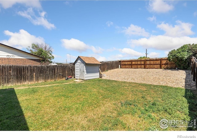 1200-1202 Parker Dr, Longmont, CO 80501 - fenced backyard with a storage unit