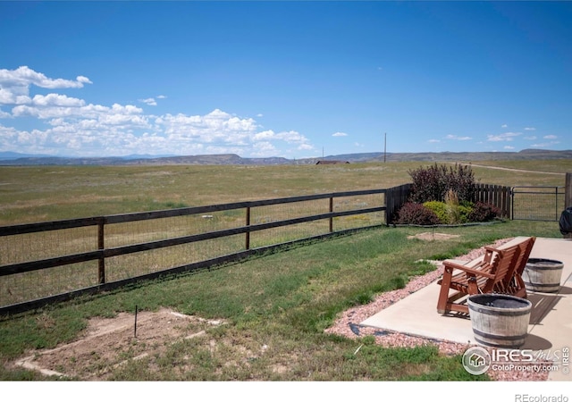 18441 Bandana Ln, Wellington, CO 80549 - view of yard featuring a view of rural / pastoral area and a patio