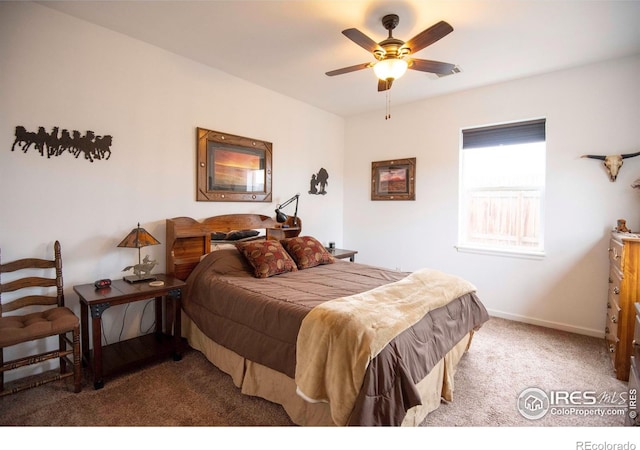 18441 Bandana Ln, Wellington, CO 80549 - carpeted bedroom featuring baseboards and a ceiling fan