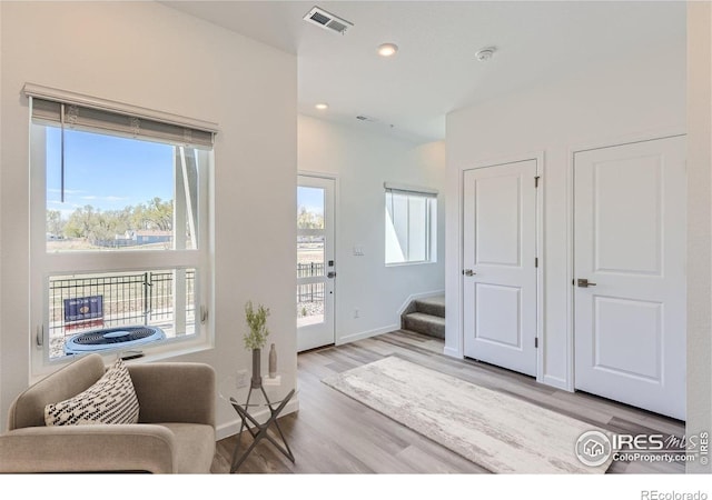 919 Schlagel St Unit 3, Fort Collins, CO 80524 - living area with wood finished floors, stairway, and recessed lighting