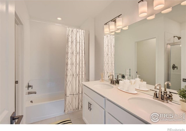 919 Schlagel St Unit 3, Fort Collins, CO 80524 - full bath featuring double vanity, tile patterned flooring, recessed lighting, and shower / bath combo with shower curtain