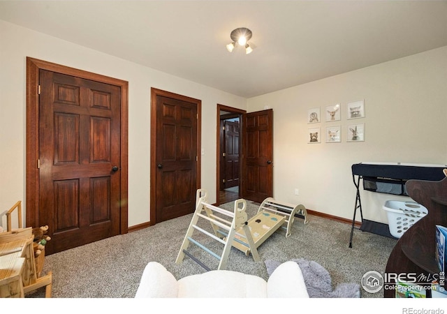 228 Mount Everest Dr, Livermore, CO 80536 - carpeted bedroom featuring baseboards