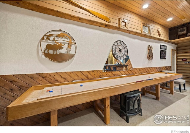 228 Mount Everest Dr, Livermore, CO 80536 - dining room with wood ceiling, a wood stove, and recessed lighting