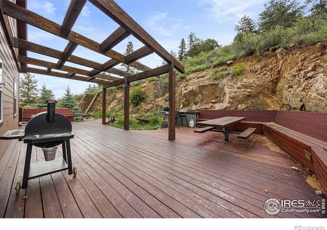 228 Mount Everest Dr, Livermore, CO 80536 - deck with a pergola and area for grilling